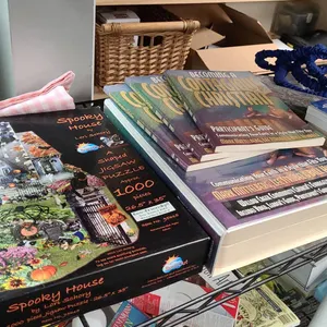 Lot: Shaped Puzzle, Books, Expandable Hose, and More