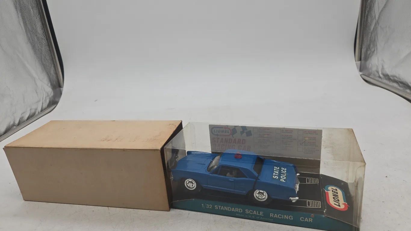 Vintage Lionel number 5215 Buick Riviera State patrol slot car in original box