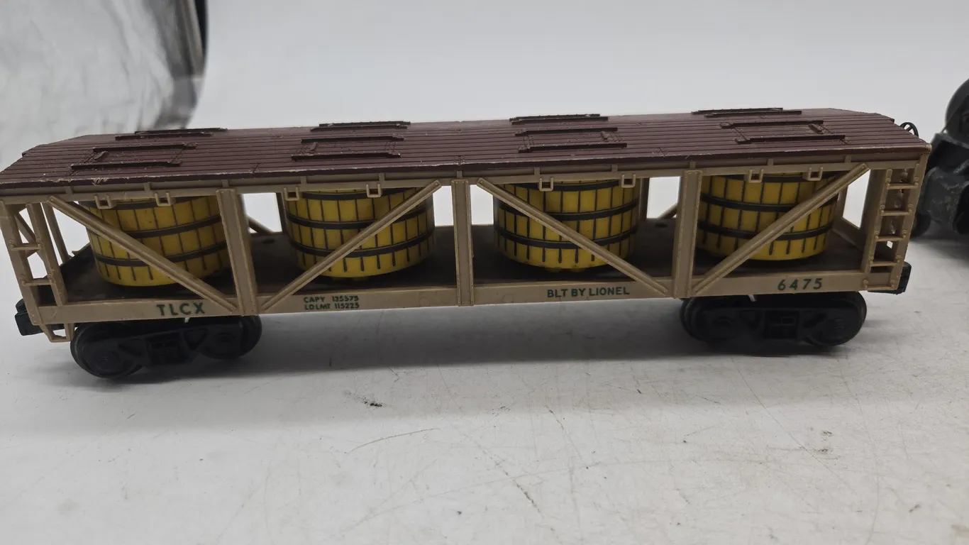 Vintage Lionel number 6475 pickle barrel hauling car