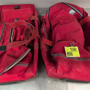 30"x16" Kipling roller duffel bags with telescopic handles