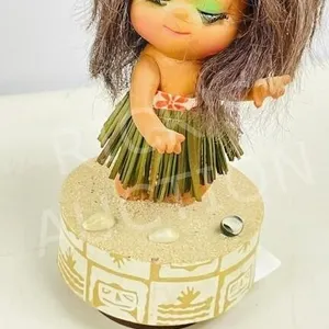 8" tall musical hula dancer - working