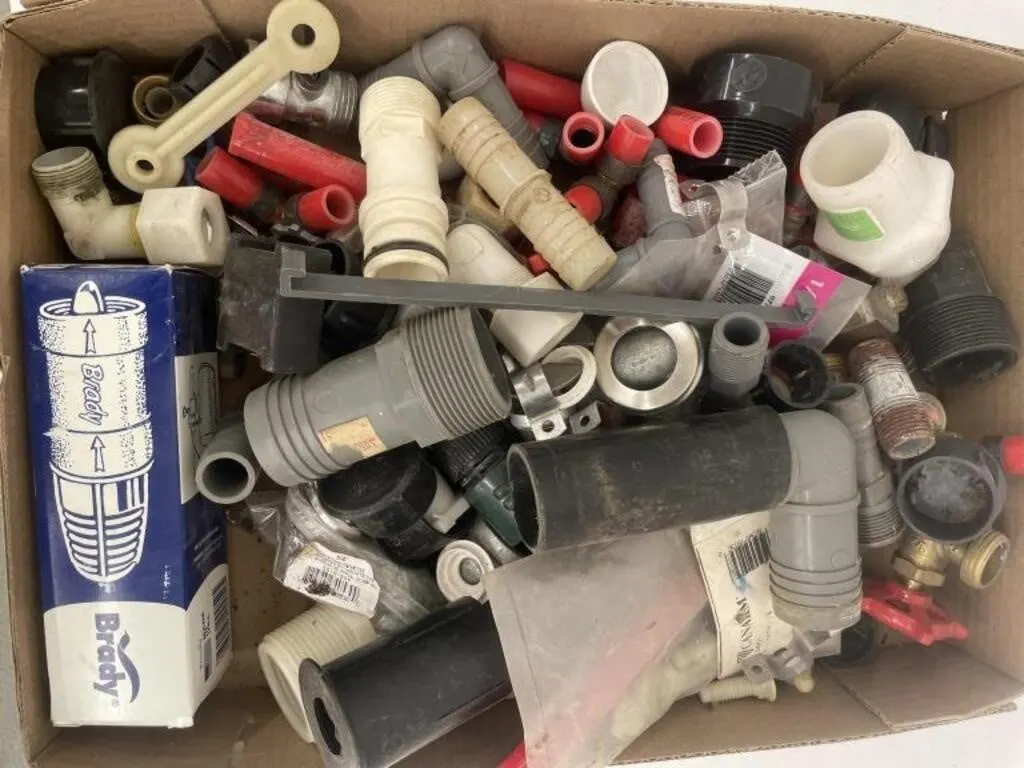 Assortment of mixed plastic and metal plumbing
