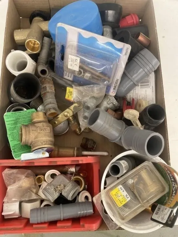 Assortment of mixed plastic and metal plumbing
