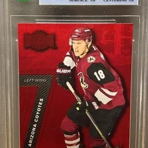 Grade 8.5 MNT Fleer 2016-17 Christian Dvorak