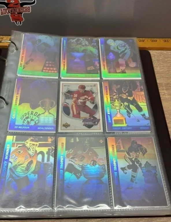 Binder of Asst. Hockey Cards & Extra Pages.