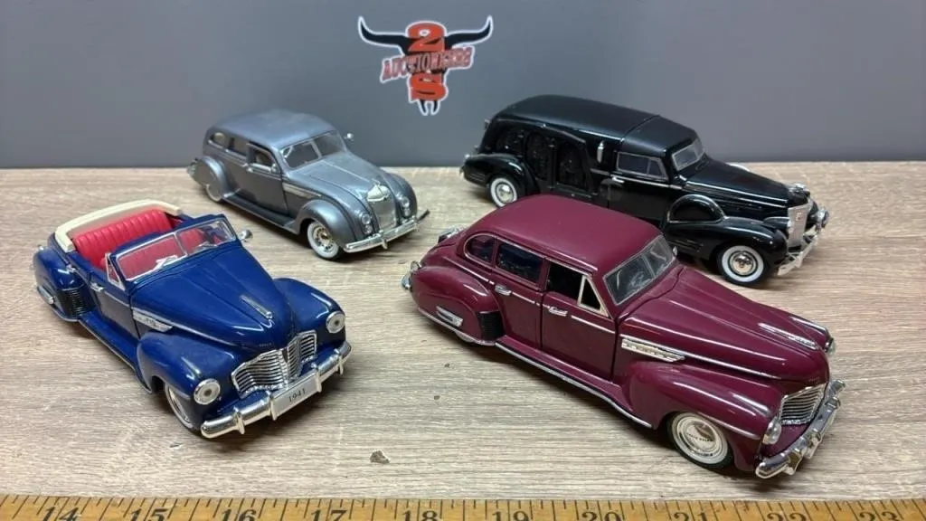 4 Vintage Toy Automobiles. China.