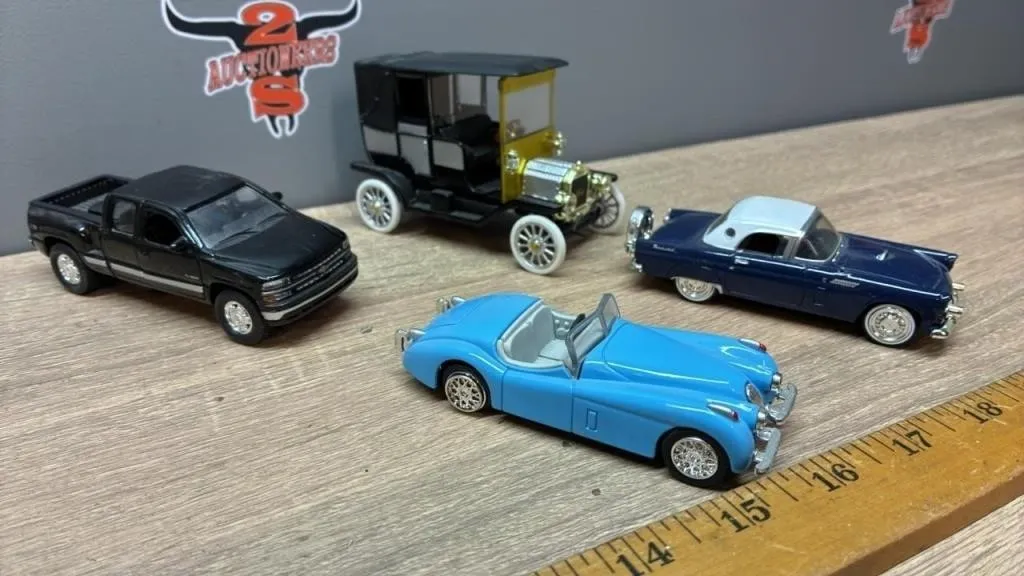 4 Toy Automobiles. China.
