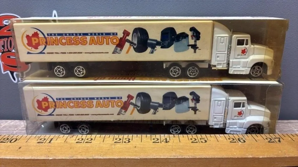 Pair of Power Fist Semi Trucks.