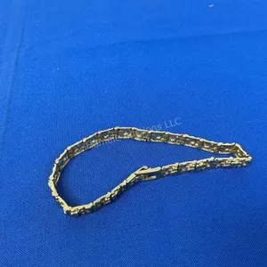 Nugget Texture Bracelet marked 10K, approx 9 grams