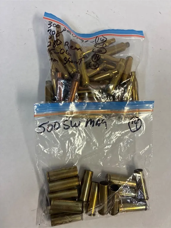 500, 300, 308, 280 cal 64 assorted Brass Casings