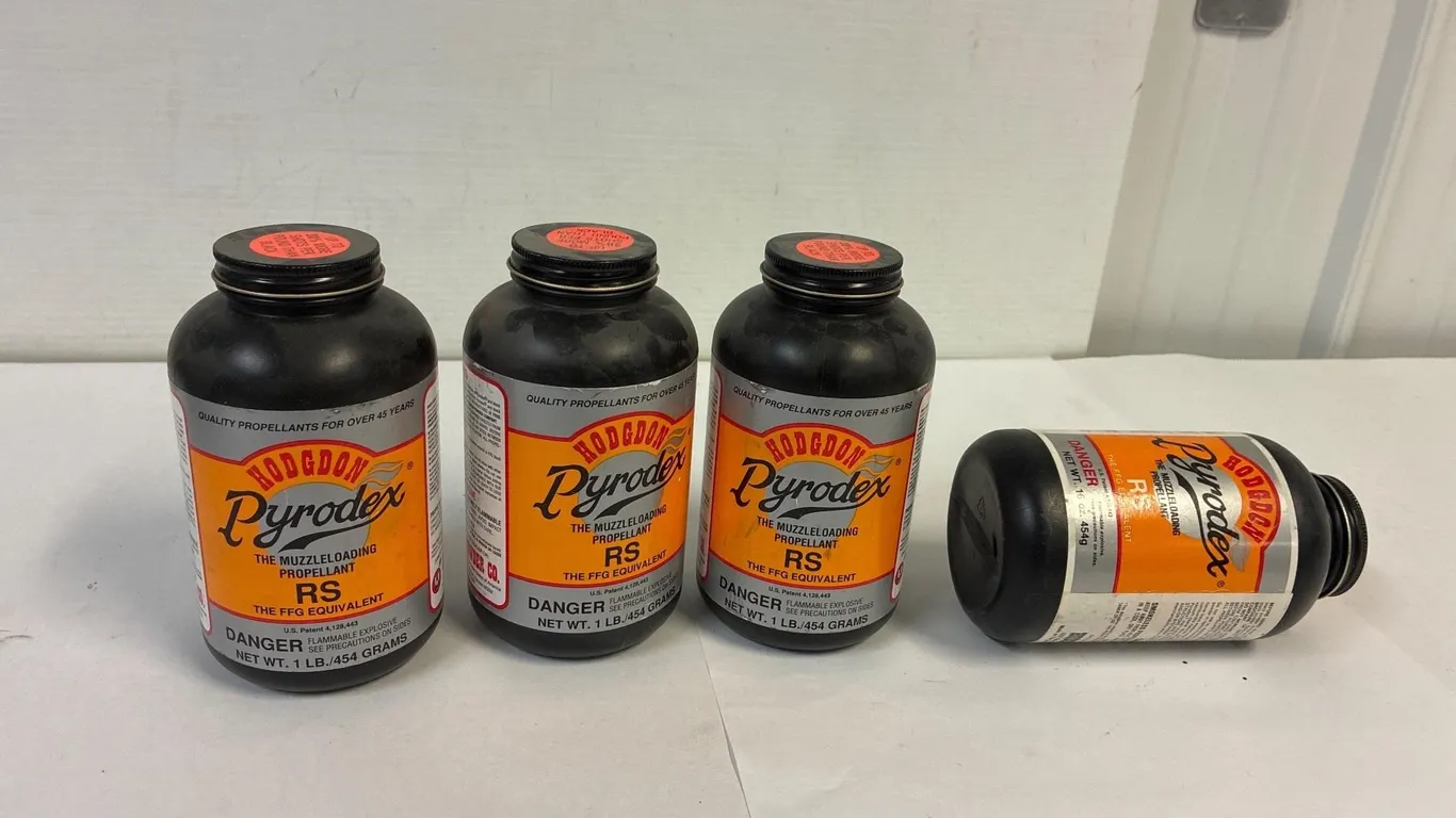 Pyrodex propellant 1 full, 2 close to full.
