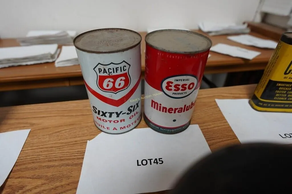 vintage Pacific 66 and Esso motor oil cans