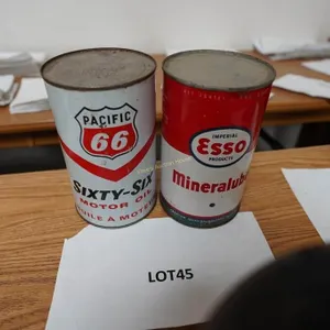 vintage Pacific 66 and Esso motor oil cans