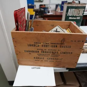 wooden shotgun shells crate of license plates