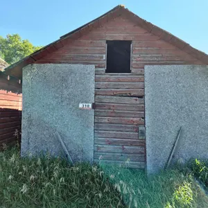 Wooden Storage Shed With Tires
 UNRESERVED
