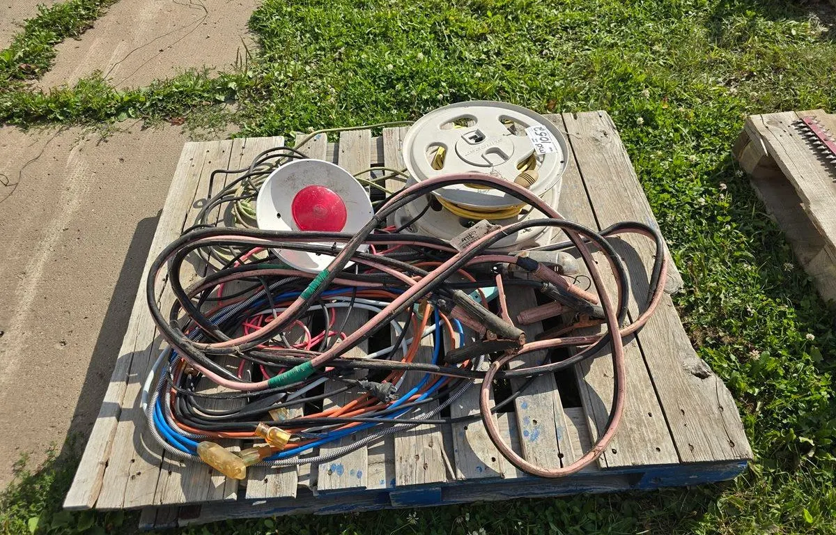 Assorted Extension Cords, Booster Cables and light
UNRESERVED