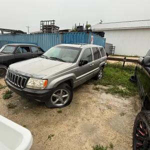 2001 Jeep Grand Cherokee. Rebuilt Status. Comes with TOD and Key. 