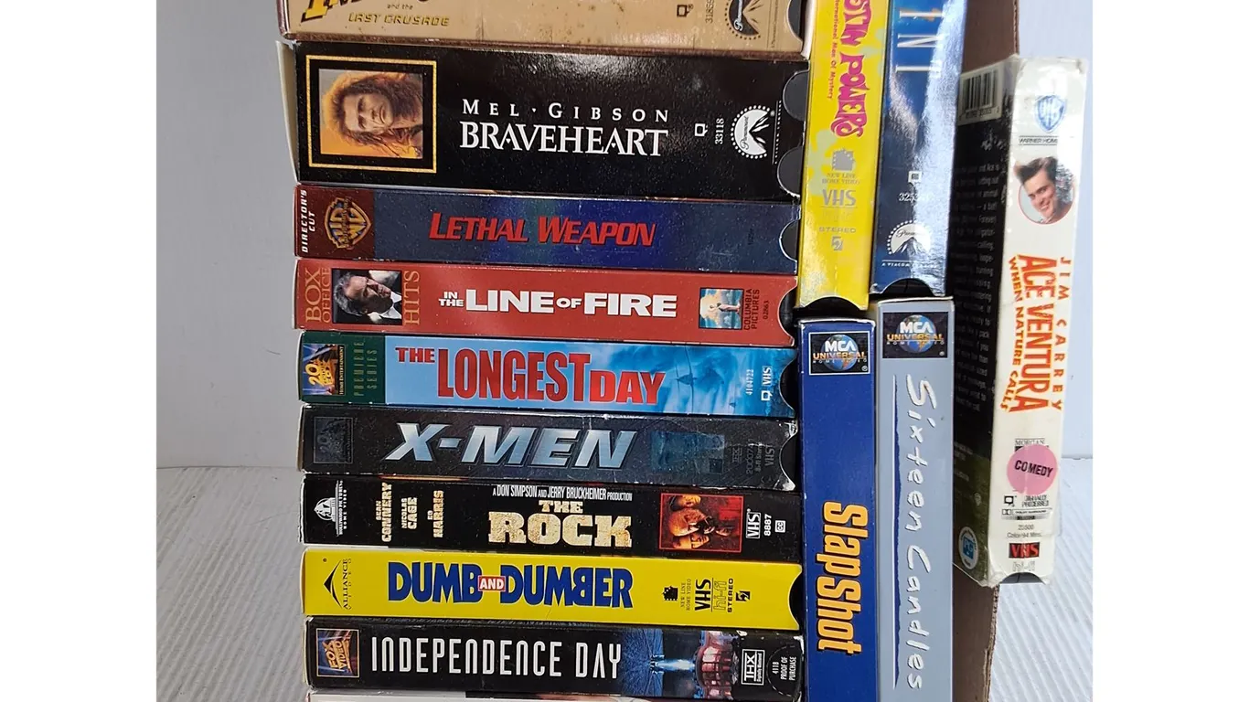 (16) VHS Movies-Indiana Jones Collection,Lethal Weapon,Dumb and Dumber and more