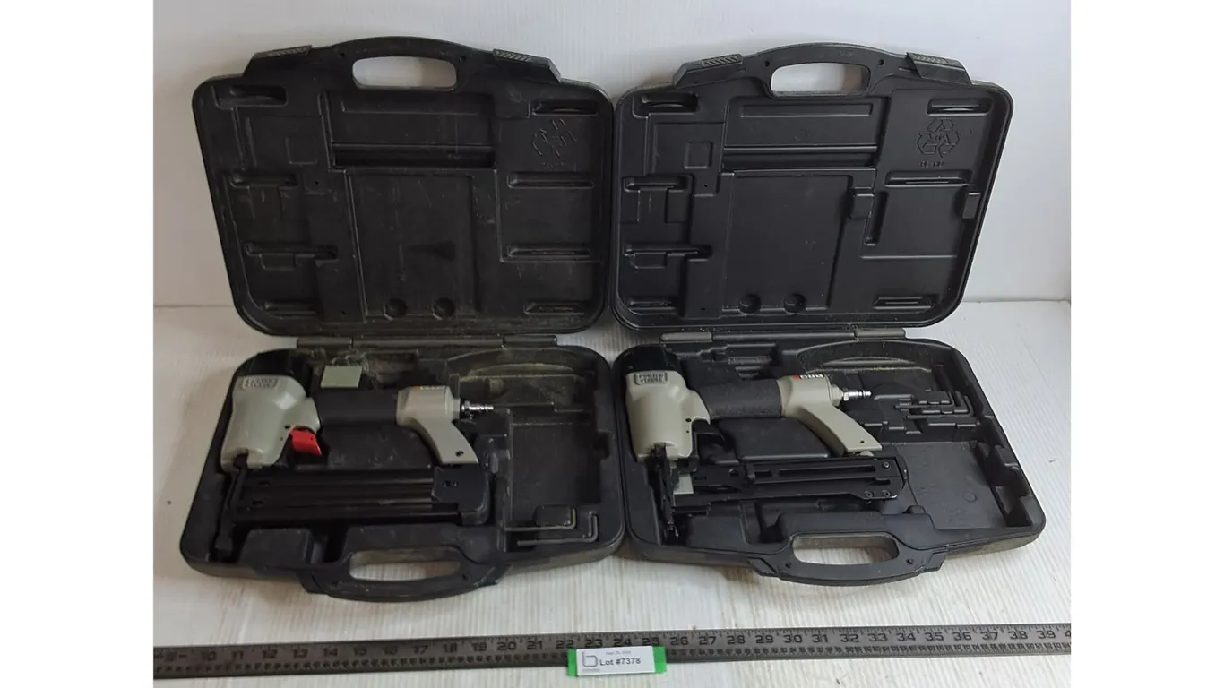 (2) Porter Cable Pneumatic Nail Guns w/Storage Cases