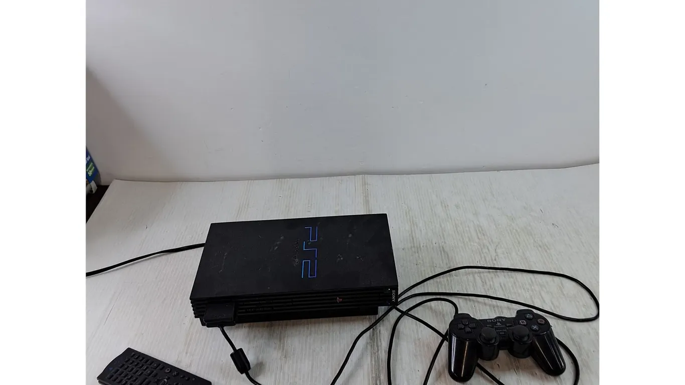 PlayStation 2 Powers On with Remote and Wired Controller