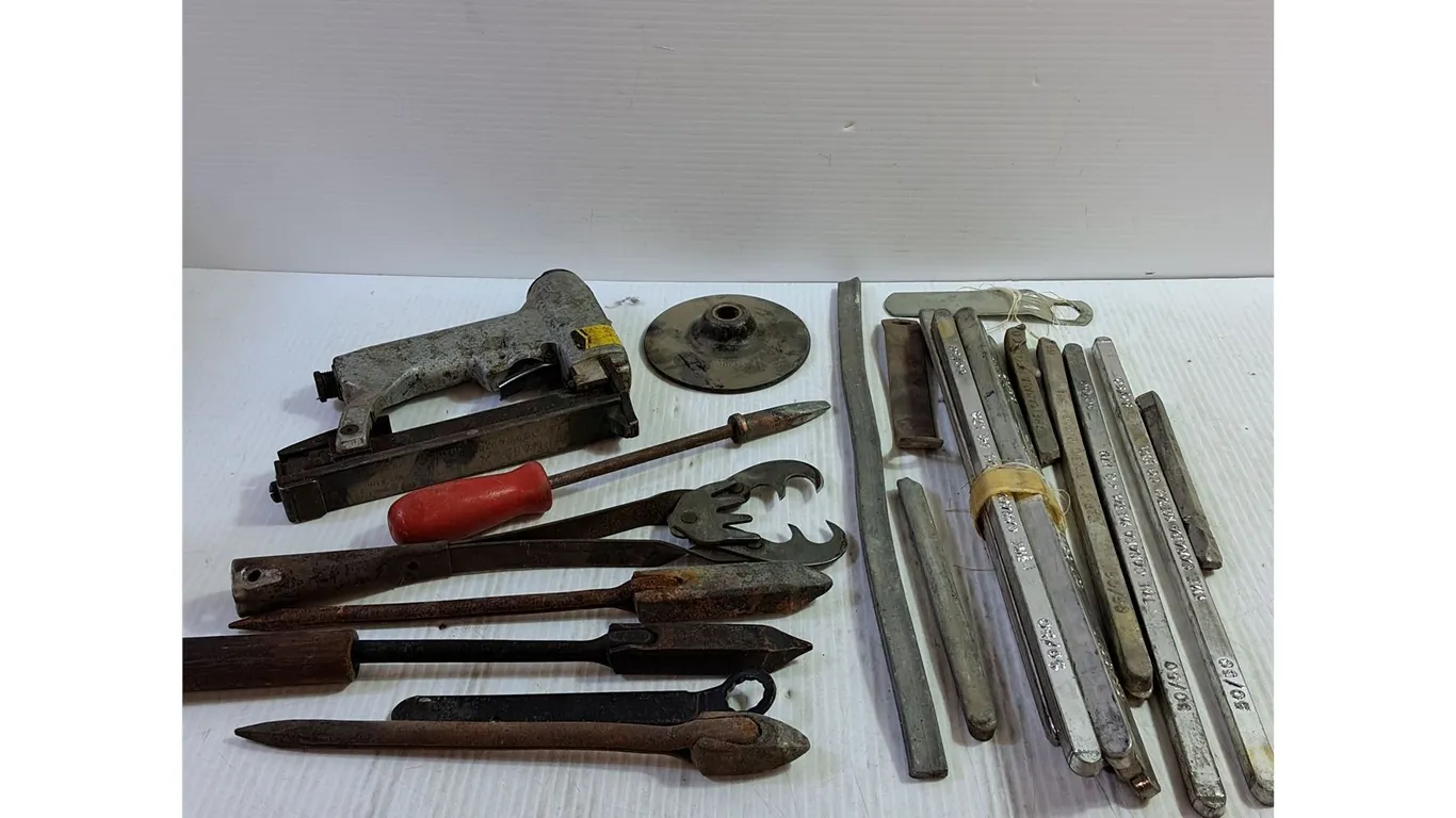 Assorted Chunks of Lead, Staple Gun, Various Tools