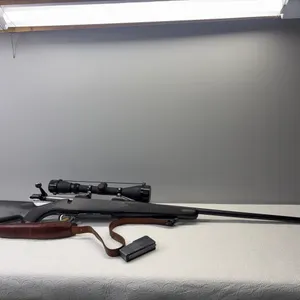 BROWNING 7MM BOLT ACTION RIFLE W/ SCOPE