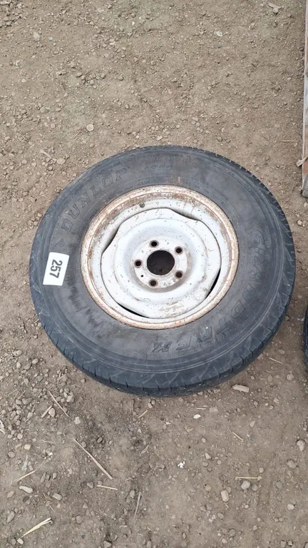 Tire with rim. Size 225/75R15