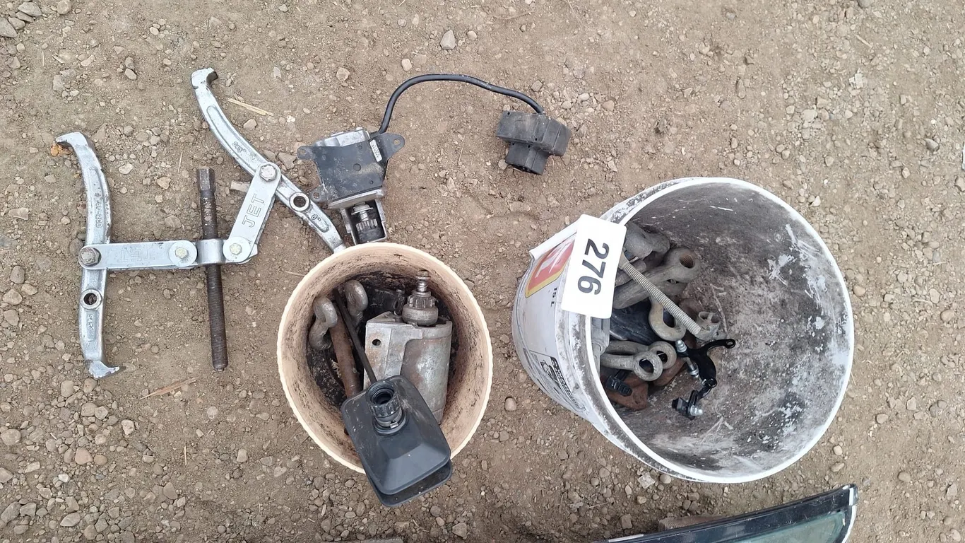 Pail of miscellaneous parts