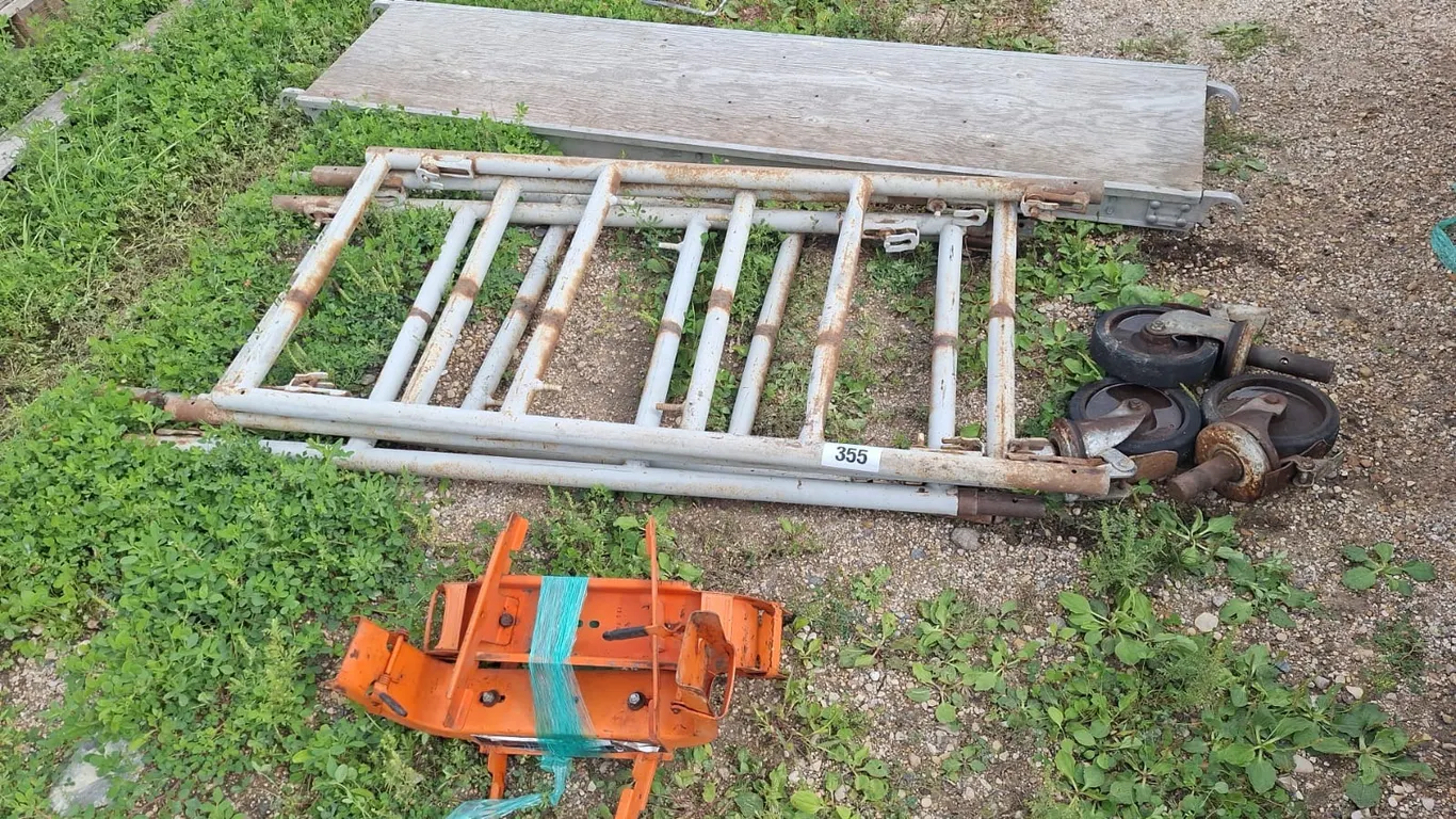 Scaffolding with brackets and casters. 7Ft