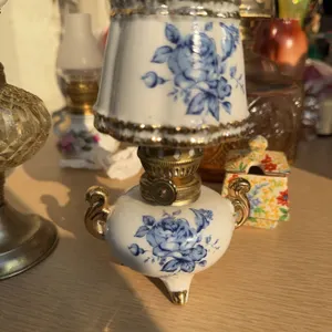 Porcelain Miniature Oil Lamp with Blue Floral Design and Gold Accents
