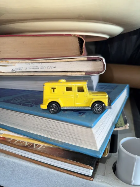 3 Die-Cast Vehicles: Yellow Armoured Car, Blue Ford Tractor, Beige Sports Car
