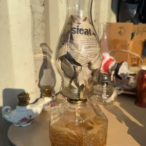 Amber Glass Oil Lamp with Embossed Horse and Carriage Motif