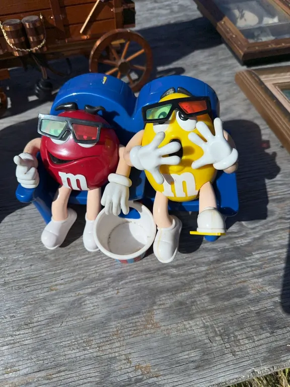 M&M’s Red and Yellow 3D Plastic Candy Dispensers in Movie Theater Seats
