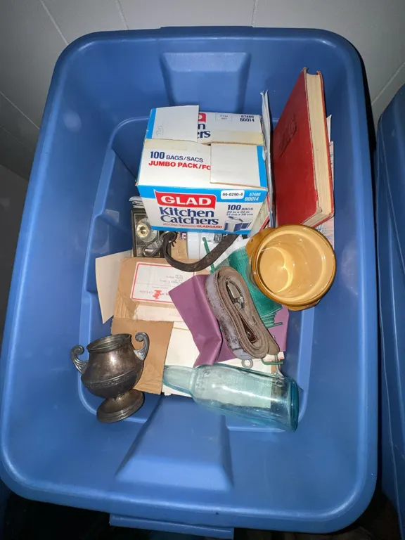 Miscellaneous Household and Collectible Items in Storage Bin