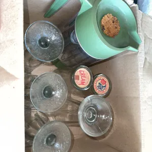 Glass Milk Bottles With Vintage Cream Caps, Ice Cream Glasses, And Pitcher