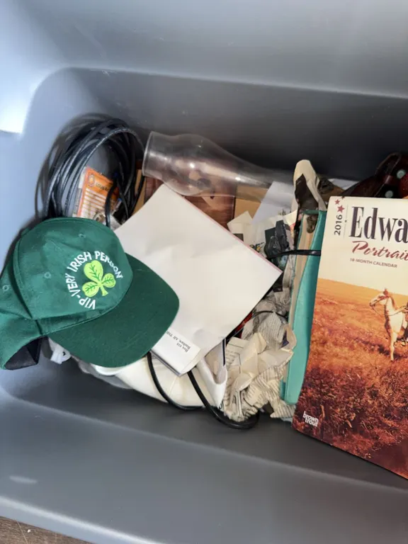Box Lot: 2016 Edward S. Curtis Calendar, Plastic Hunter Figurine, Sharp VCR & Miscellaneous Items