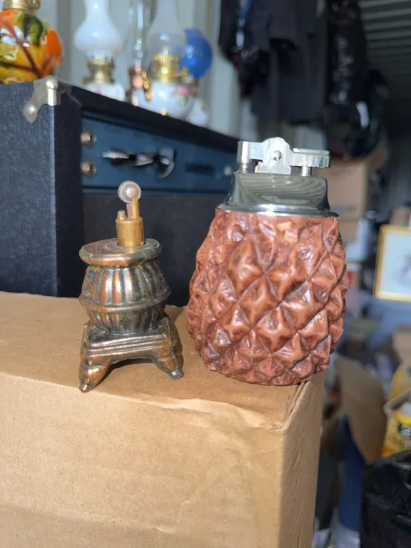 Table Lighters Including Pinecone, Stove, and Train Designs