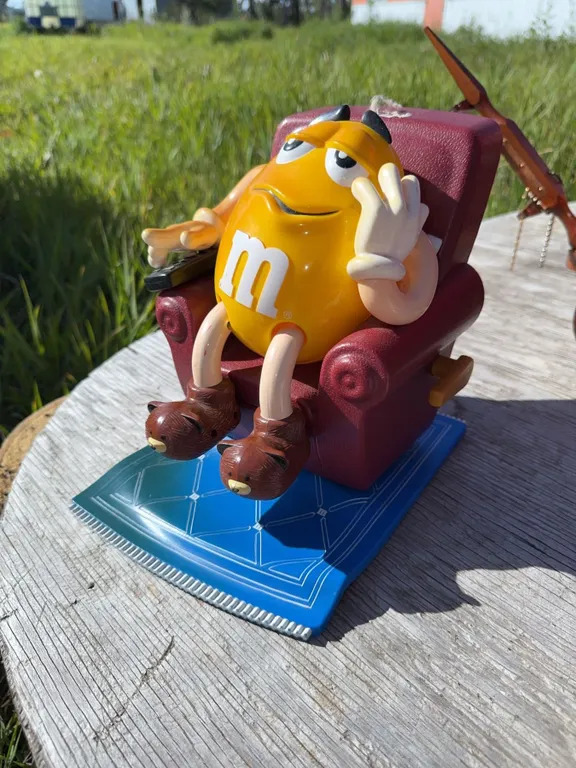 Yellow M&M Character Figure in Recliner Chair