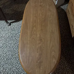Oval Wooden Coffee Table With Six Drawers and Lower Shelf