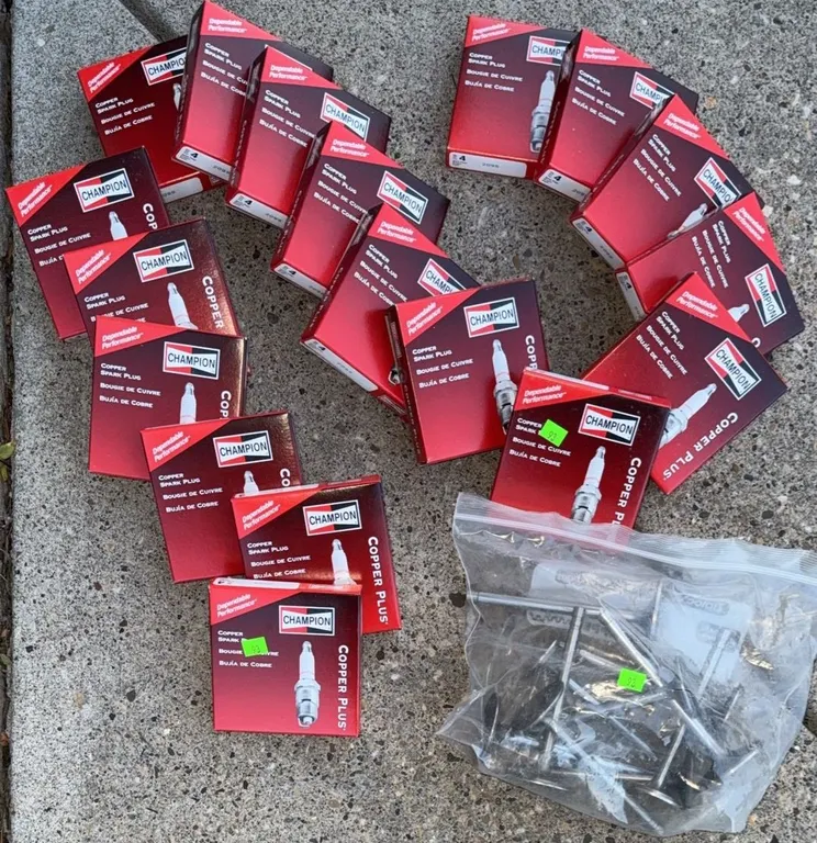 16 Champion Copper Plus Spark Plugs with Assorted Metal Hardware