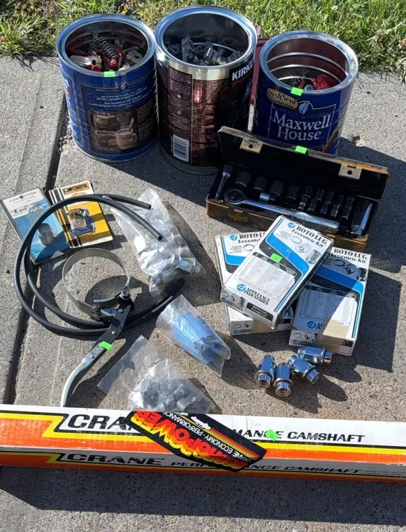 Automotive Parts Lot with Crane Performance Camshaft, Roto-Lug Kits, and Socket Set