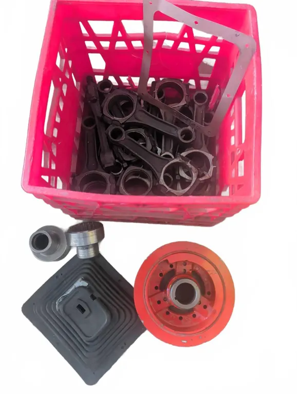 Engine Parts Including Connecting Rods, Gaskets, and Pulleys