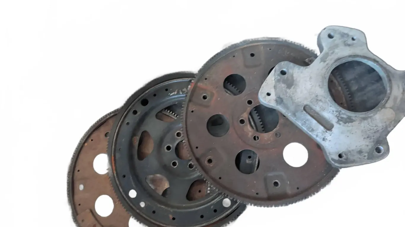 Automotive Engine Parts Assortment: Flywheels, Connecting Rods, Brackets
