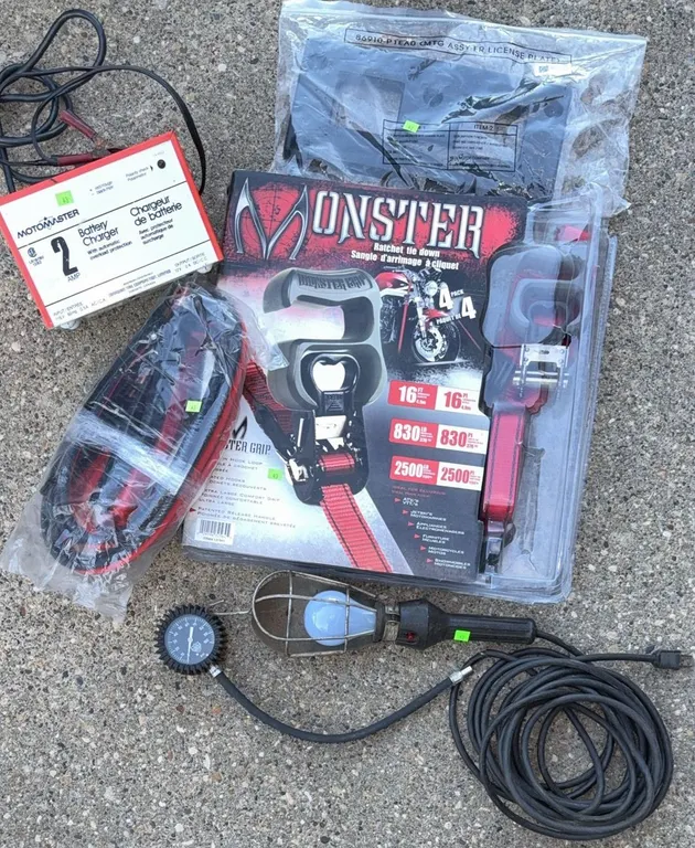 Automotive Tools Including MotoMaster Battery Charger and Monster Ratchet Tie Downs