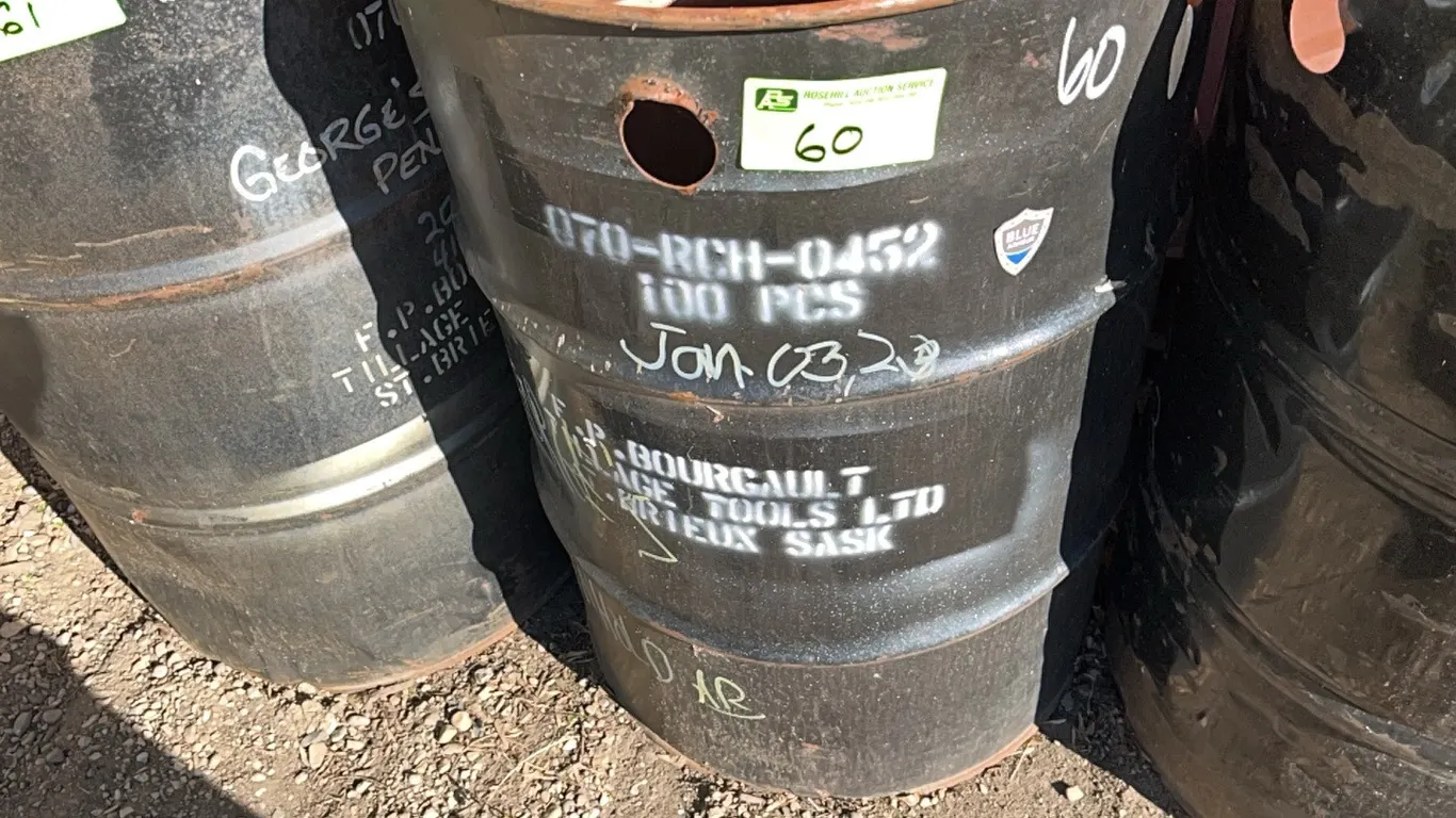 Drum of Assorted 4" Reversable Bolt on Chisel Spikes