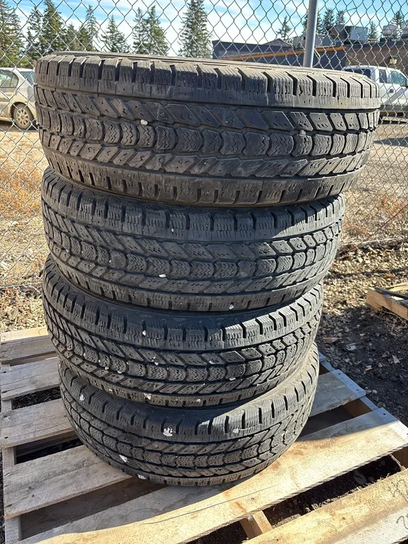 (4) Firestone Winterforce LT265/70R18 Tires