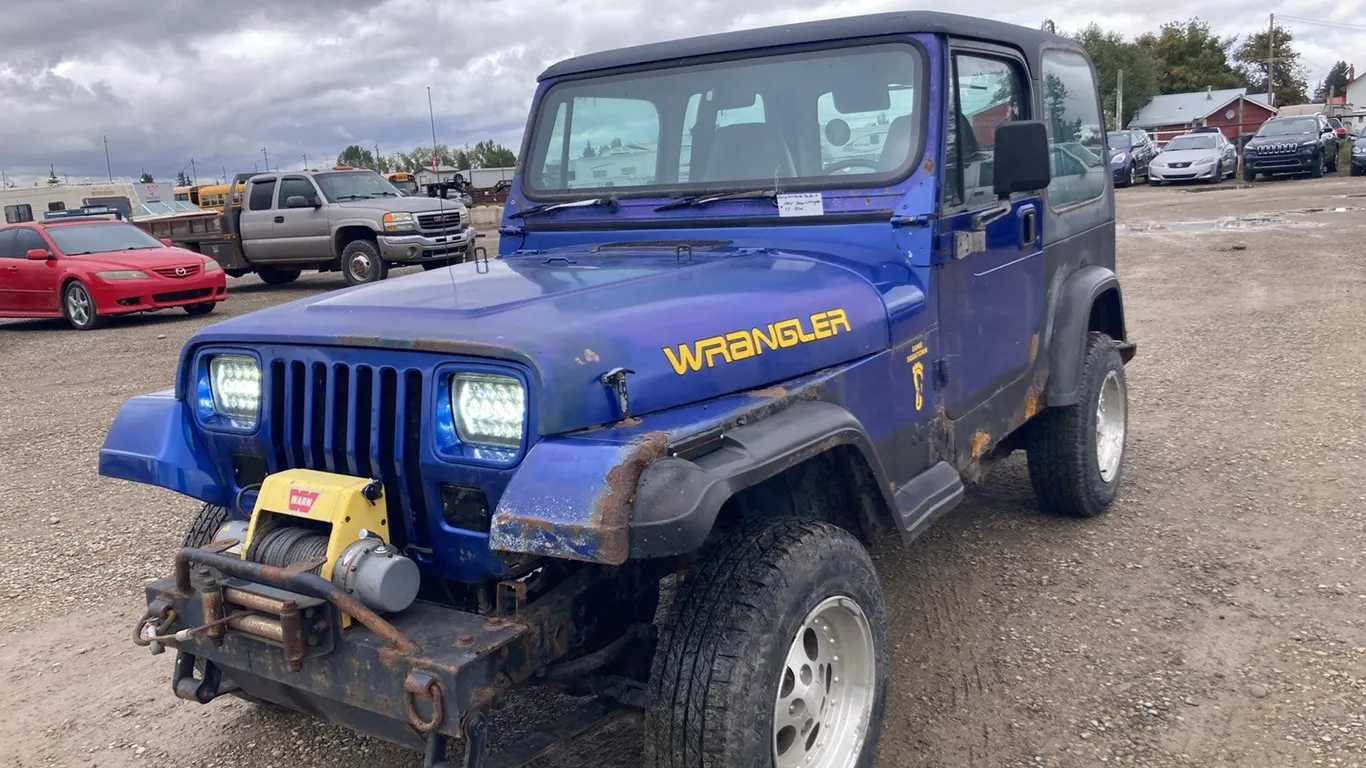 1994 Blue Jeep Wrangler YJ VIN: 1J4FY19PXRP422252 **O-433**