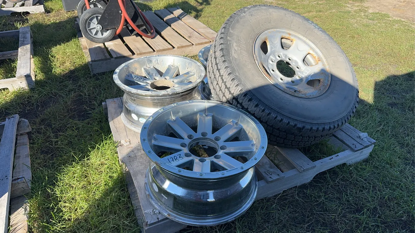 Bridgestone LT265/75R16 tire w/ 8 bolt Rim, 3 - Matching Rims - 8 Bolt