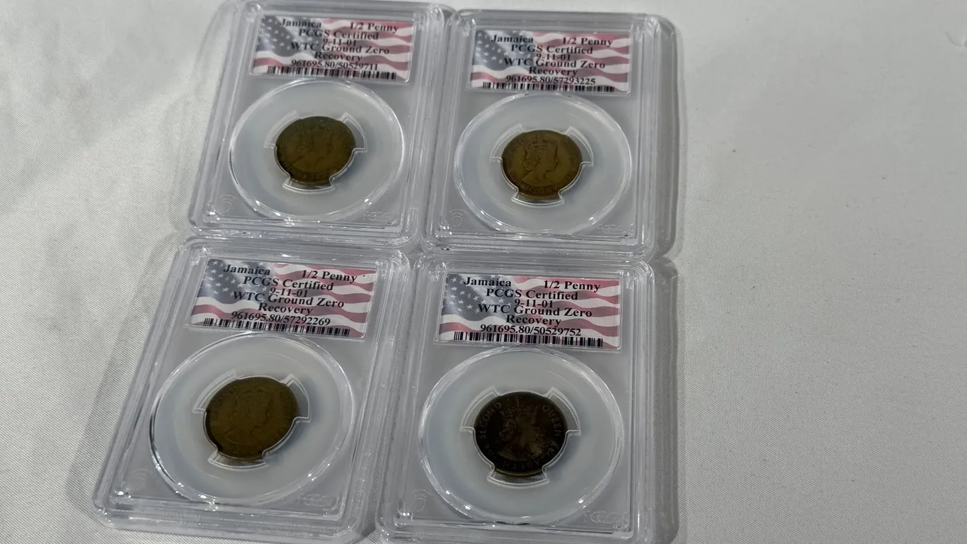 (4) GROUND ZERO JAMAICAN 1/2 PENNIES GRADED