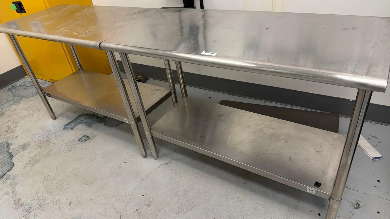 (2) STAINLESS STEEL TABLES, each with lower shelf